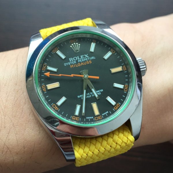 yellow perlon watch strap with Rolex on wrist